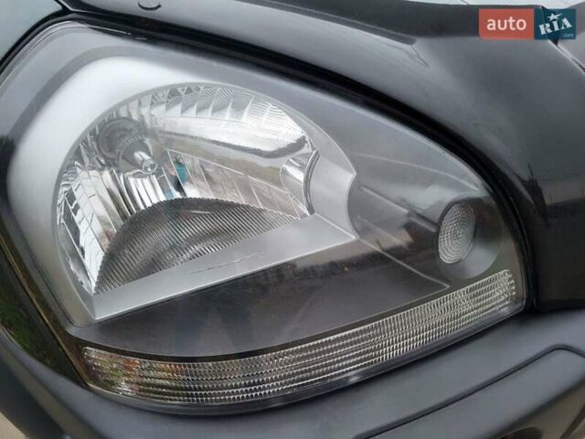 Чорний Хендай Туксон, об'ємом двигуна 1.98 л та пробігом 160 тис. км за 10300 $, фото 125 на Automoto.ua