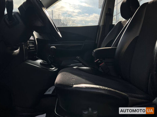 Черный Хендай Туксон, объемом двигателя 2 л и пробегом 178 тыс. км за 9600 $, фото 9 на Automoto.ua