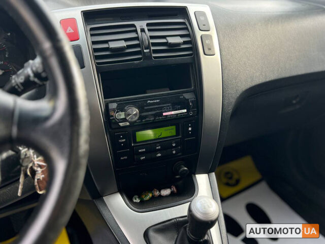 Черный Хендай Туксон, объемом двигателя 2 л и пробегом 178 тыс. км за 9600 $, фото 15 на Automoto.ua