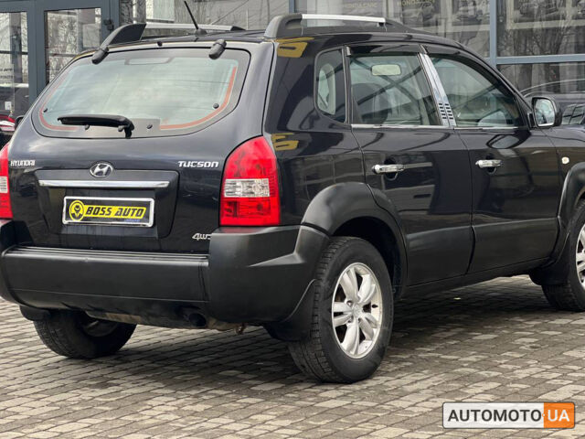 Черный Хендай Туксон, объемом двигателя 2 л и пробегом 178 тыс. км за 9600 $, фото 5 на Automoto.ua
