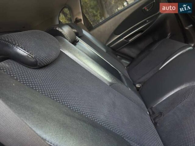 Черный Хендай Туксон, объемом двигателя 1.98 л и пробегом 140 тыс. км за 9671 $, фото 41 на Automoto.ua