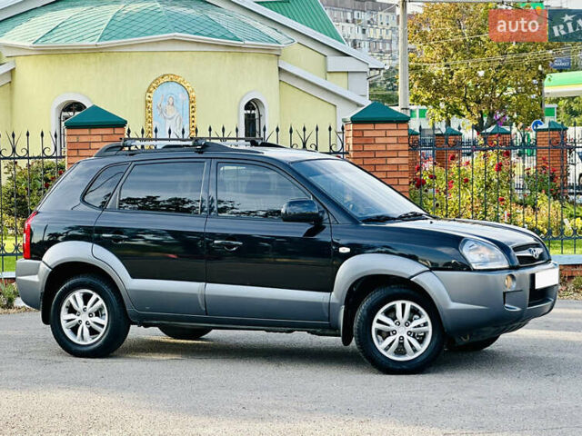 Черный Хендай Туксон, объемом двигателя 2 л и пробегом 119 тыс. км за 9600 $, фото 21 на Automoto.ua