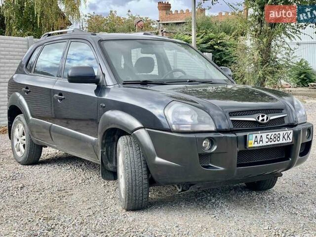 Черный Хендай Туксон, объемом двигателя 1.98 л и пробегом 158 тыс. км за 8200 $, фото 24 на Automoto.ua