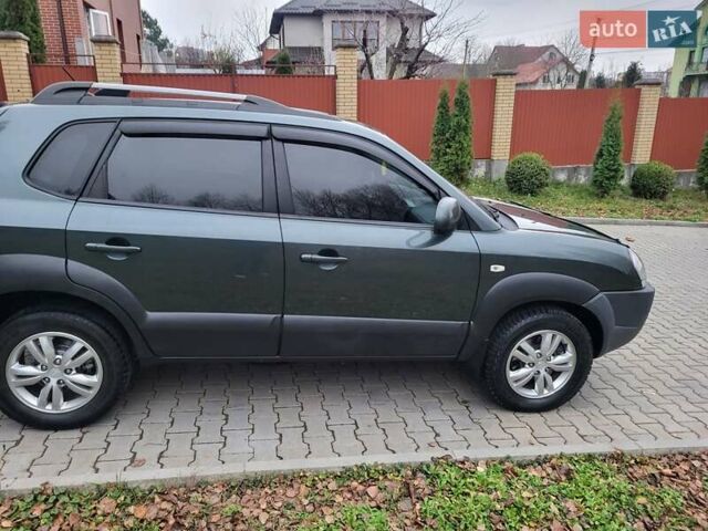 Чорний Хендай Туксон, об'ємом двигуна 1.98 л та пробігом 160 тис. км за 10300 $, фото 9 на Automoto.ua