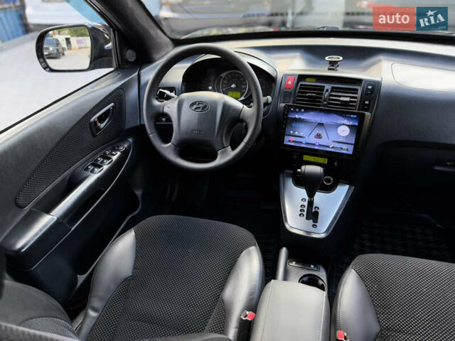 Чорний Хендай Туксон, об'ємом двигуна 1.99 л та пробігом 280 тис. км за 8900 $, фото 52 на Automoto.ua
