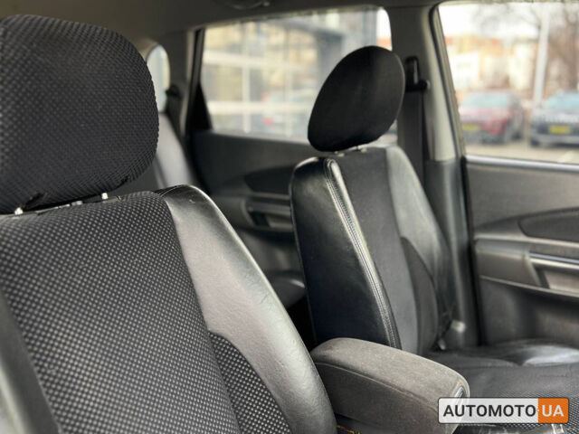 Черный Хендай Туксон, объемом двигателя 2 л и пробегом 178 тыс. км за 9600 $, фото 18 на Automoto.ua