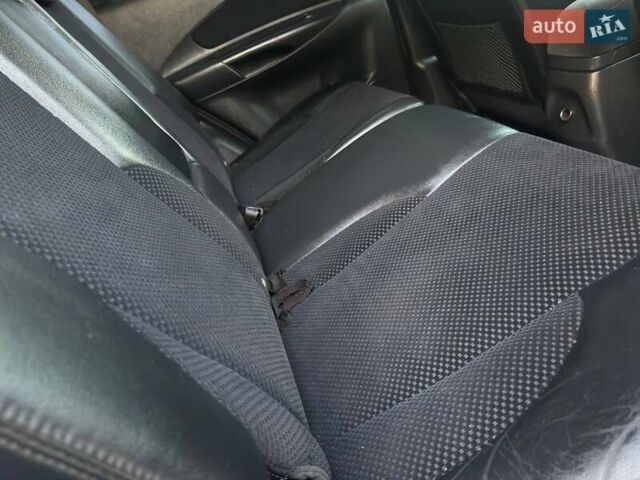 Черный Хендай Туксон, объемом двигателя 1.98 л и пробегом 140 тыс. км за 9671 $, фото 40 на Automoto.ua