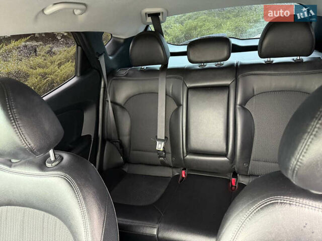 Черный Хендай Туксон, объемом двигателя 2.4 л и пробегом 143 тыс. км за 12000 $, фото 19 на Automoto.ua