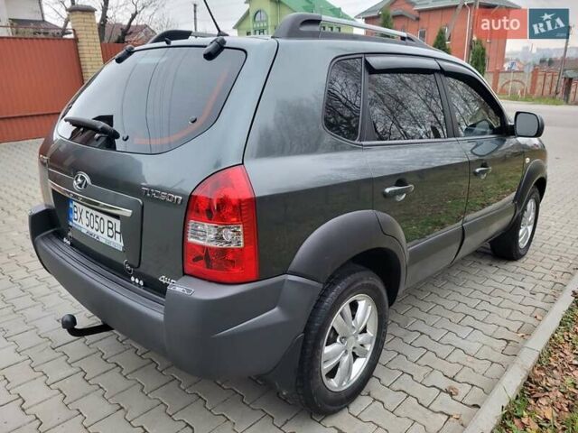 Чорний Хендай Туксон, об'ємом двигуна 1.98 л та пробігом 160 тис. км за 10300 $, фото 13 на Automoto.ua