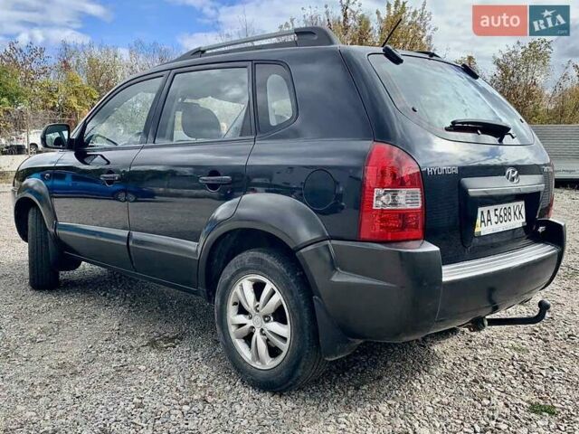 Черный Хендай Туксон, объемом двигателя 1.98 л и пробегом 158 тыс. км за 8200 $, фото 17 на Automoto.ua