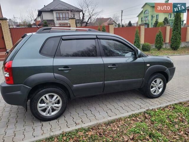 Чорний Хендай Туксон, об'ємом двигуна 1.98 л та пробігом 160 тис. км за 10300 $, фото 10 на Automoto.ua