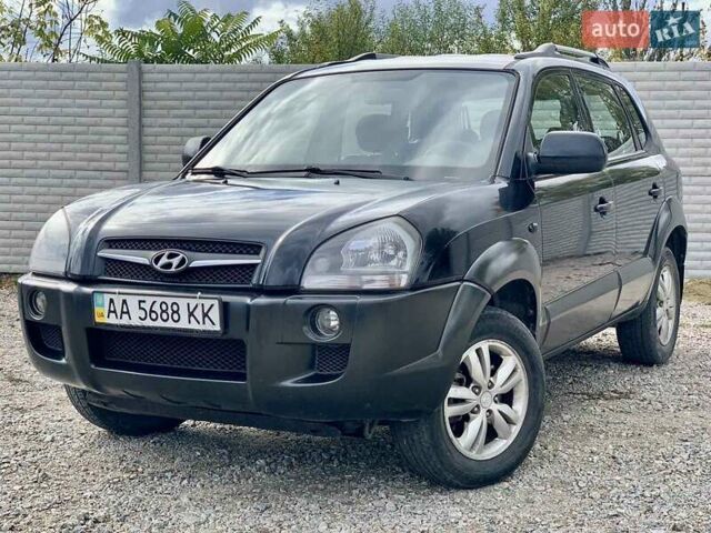 Черный Хендай Туксон, объемом двигателя 1.98 л и пробегом 158 тыс. км за 8200 $, фото 26 на Automoto.ua