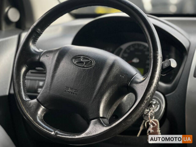 Черный Хендай Туксон, объемом двигателя 2 л и пробегом 178 тыс. км за 9600 $, фото 12 на Automoto.ua