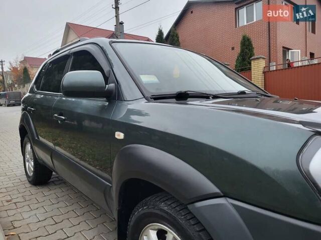 Чорний Хендай Туксон, об'ємом двигуна 1.98 л та пробігом 160 тис. км за 10300 $, фото 124 на Automoto.ua