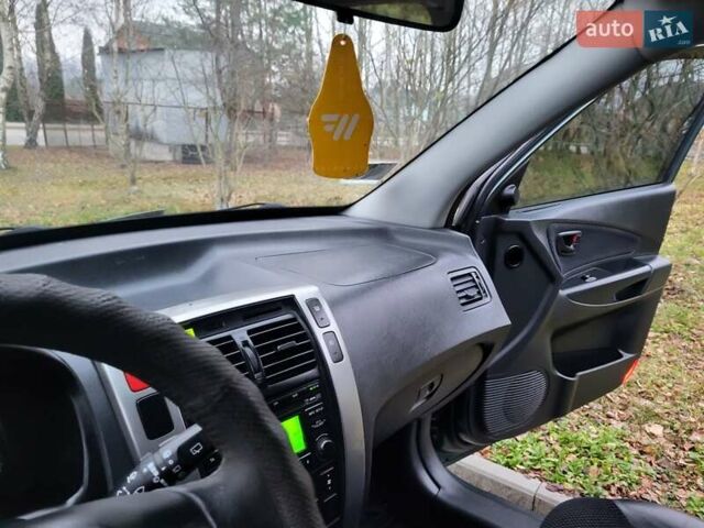 Чорний Хендай Туксон, об'ємом двигуна 1.98 л та пробігом 160 тис. км за 10300 $, фото 101 на Automoto.ua