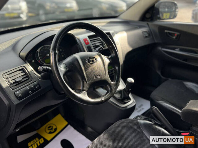 Черный Хендай Туксон, объемом двигателя 2 л и пробегом 178 тыс. км за 9600 $, фото 8 на Automoto.ua