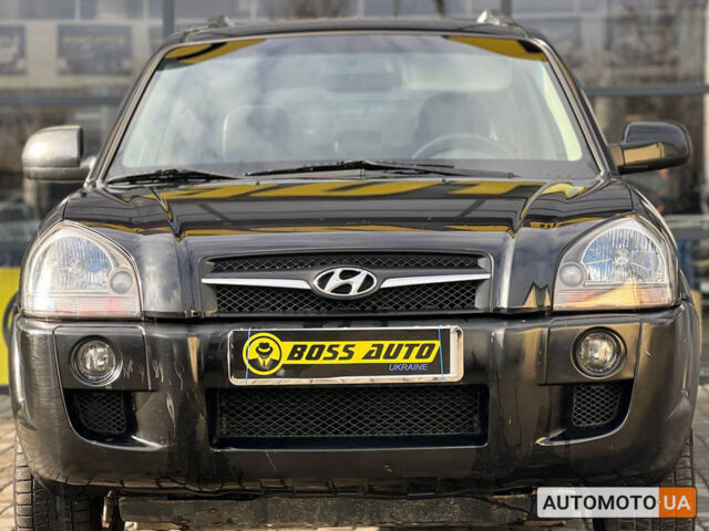 Черный Хендай Туксон, объемом двигателя 2 л и пробегом 178 тыс. км за 9600 $, фото 1 на Automoto.ua