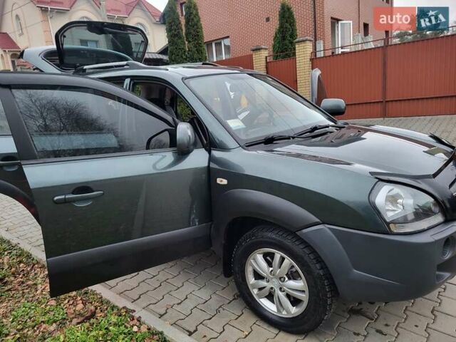 Чорний Хендай Туксон, об'ємом двигуна 1.98 л та пробігом 160 тис. км за 10300 $, фото 79 на Automoto.ua