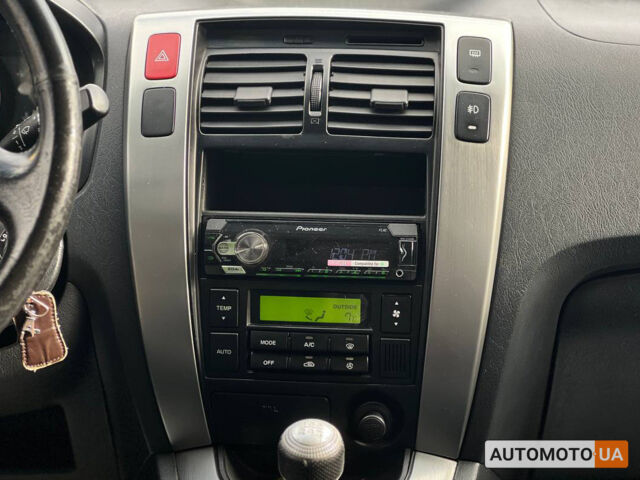 Черный Хендай Туксон, объемом двигателя 2 л и пробегом 178 тыс. км за 9600 $, фото 16 на Automoto.ua