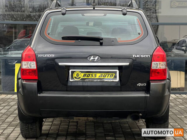 Черный Хендай Туксон, объемом двигателя 2 л и пробегом 178 тыс. км за 9600 $, фото 4 на Automoto.ua