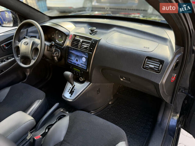 Чорний Хендай Туксон, об'ємом двигуна 1.99 л та пробігом 280 тис. км за 8900 $, фото 46 на Automoto.ua