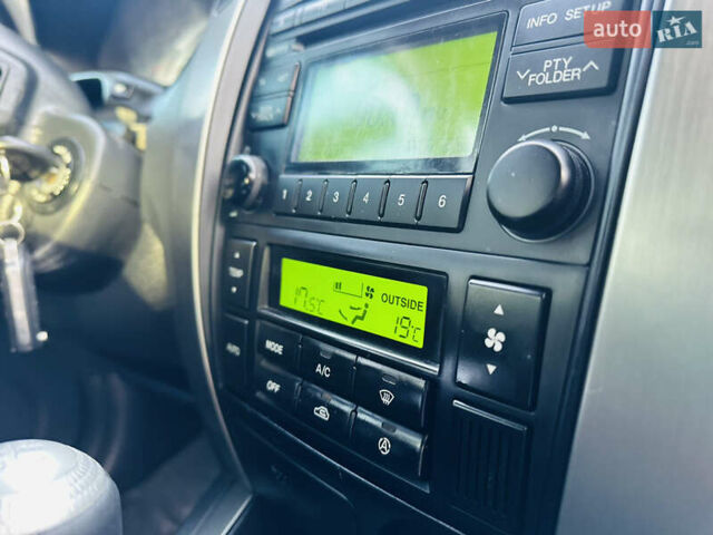 Черный Хендай Туксон, объемом двигателя 2 л и пробегом 119 тыс. км за 9600 $, фото 11 на Automoto.ua