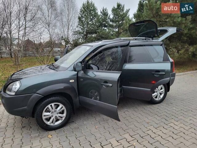 Чорний Хендай Туксон, об'ємом двигуна 1.98 л та пробігом 160 тис. км за 10300 $, фото 53 на Automoto.ua