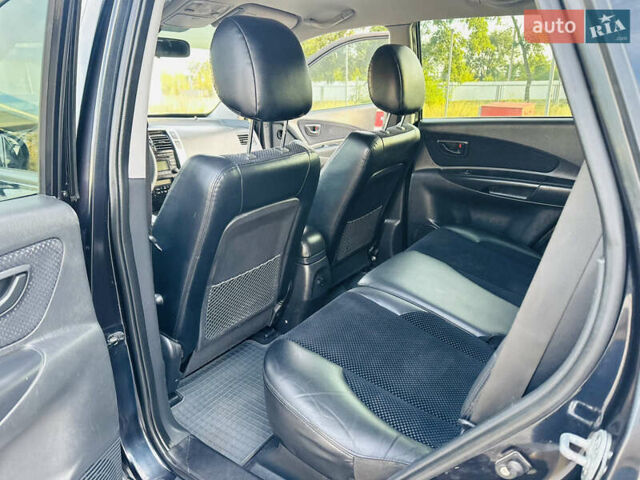 Черный Хендай Туксон, объемом двигателя 2 л и пробегом 119 тыс. км за 9600 $, фото 26 на Automoto.ua
