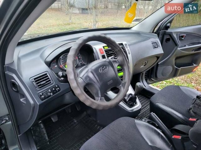 Чорний Хендай Туксон, об'ємом двигуна 1.98 л та пробігом 160 тис. км за 10300 $, фото 98 на Automoto.ua