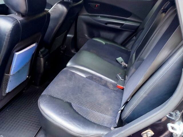 Черный Хендай Туксон, объемом двигателя 2 л и пробегом 258 тыс. км за 9000 $, фото 4 на Automoto.ua