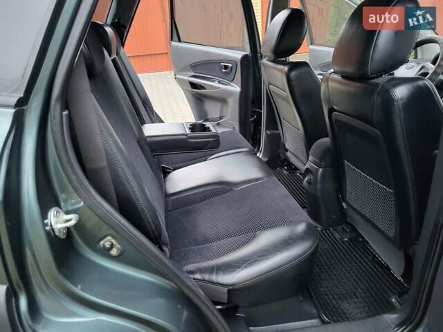 Чорний Хендай Туксон, об'ємом двигуна 1.98 л та пробігом 160 тис. км за 10300 $, фото 112 на Automoto.ua