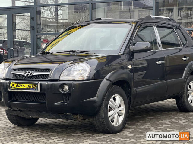 Черный Хендай Туксон, объемом двигателя 2 л и пробегом 178 тыс. км за 9600 $, фото 2 на Automoto.ua