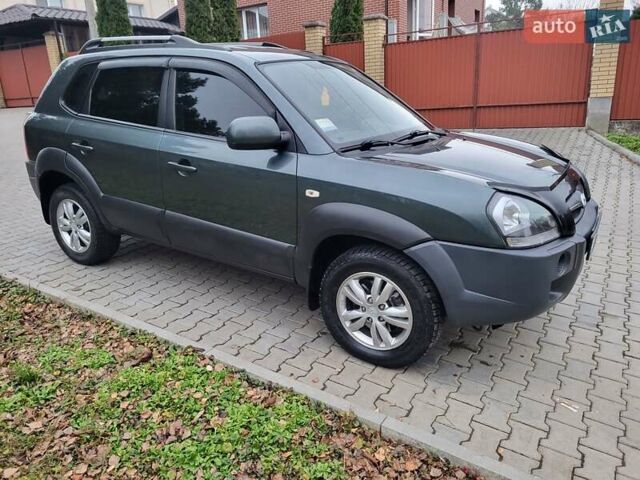 Чорний Хендай Туксон, об'ємом двигуна 1.98 л та пробігом 160 тис. км за 10300 $, фото 8 на Automoto.ua