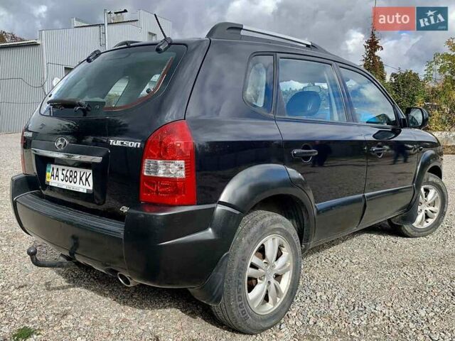 Черный Хендай Туксон, объемом двигателя 1.98 л и пробегом 158 тыс. км за 8200 $, фото 18 на Automoto.ua
