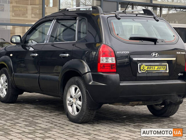 Черный Хендай Туксон, объемом двигателя 2 л и пробегом 178 тыс. км за 9600 $, фото 3 на Automoto.ua