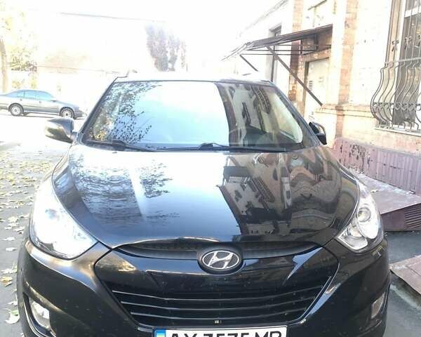 Черный Хендай Туксон, объемом двигателя 2.4 л и пробегом 132 тыс. км за 12900 $, фото 2 на Automoto.ua