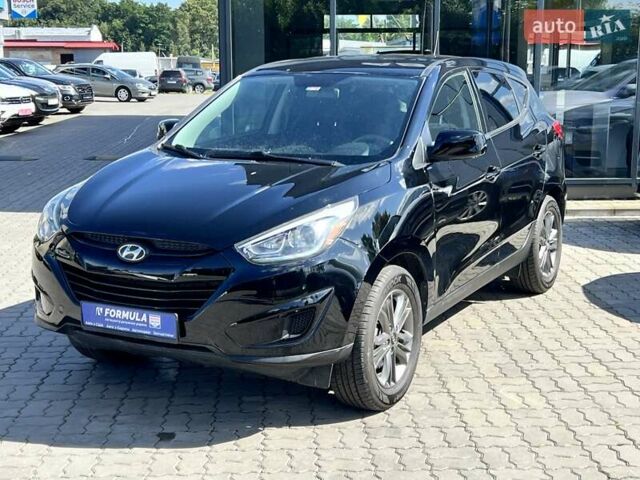 Чорний Хендай Туксон, об'ємом двигуна 2 л та пробігом 164 тис. км за 11490 $, фото 7 на Automoto.ua