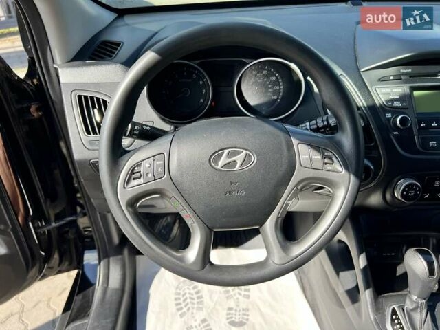 Чорний Хендай Туксон, об'ємом двигуна 2 л та пробігом 164 тис. км за 11490 $, фото 15 на Automoto.ua