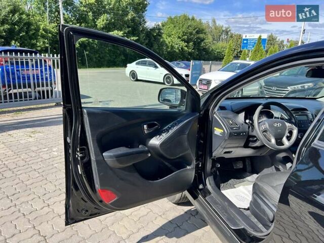 Чорний Хендай Туксон, об'ємом двигуна 2 л та пробігом 164 тис. км за 11490 $, фото 10 на Automoto.ua