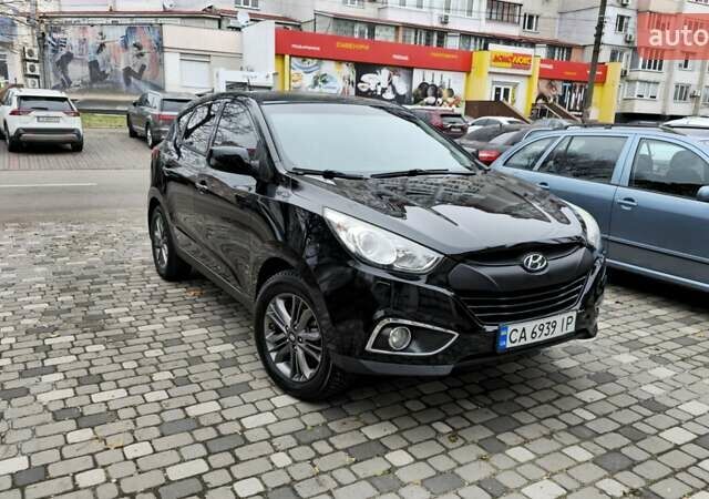 Чорний Хендай Туксон, об'ємом двигуна 2 л та пробігом 160 тис. км за 12300 $, фото 3 на Automoto.ua