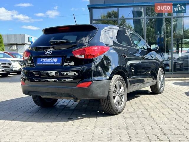 Чорний Хендай Туксон, об'ємом двигуна 2 л та пробігом 164 тис. км за 11490 $, фото 37 на Automoto.ua