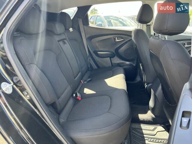 Чорний Хендай Туксон, об'ємом двигуна 2 л та пробігом 164 тис. км за 11490 $, фото 26 на Automoto.ua