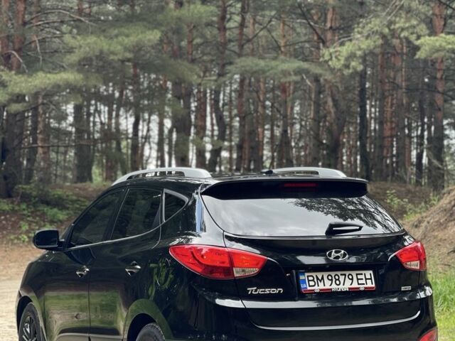 Чорний Хендай Туксон, об'ємом двигуна 2.4 л та пробігом 140 тис. км за 11999 $, фото 2 на Automoto.ua