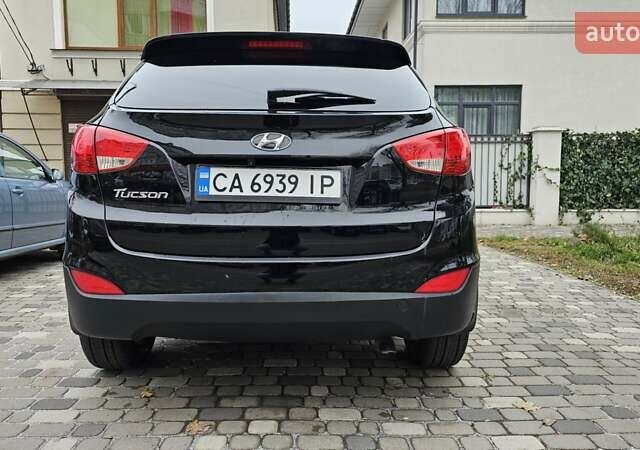 Чорний Хендай Туксон, об'ємом двигуна 2 л та пробігом 160 тис. км за 12300 $, фото 5 на Automoto.ua