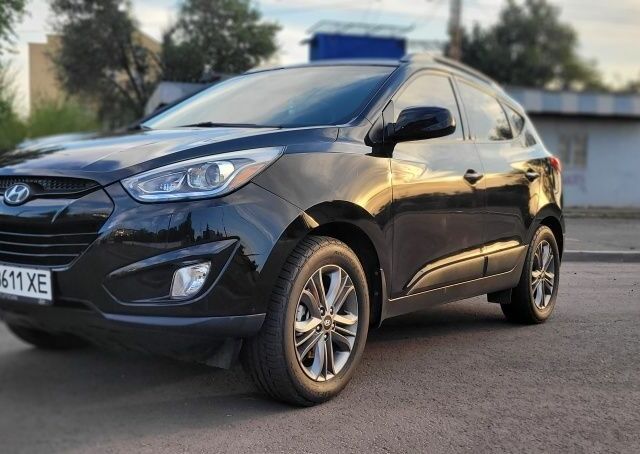 Черный Хендай Туксон, объемом двигателя 2.4 л и пробегом 130 тыс. км за 12400 $, фото 7 на Automoto.ua