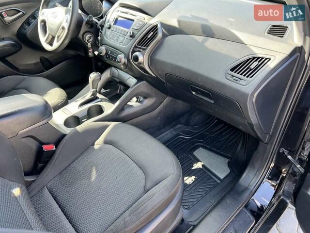 Чорний Хендай Туксон, об'ємом двигуна 2 л та пробігом 164 тис. км за 11490 $, фото 24 на Automoto.ua