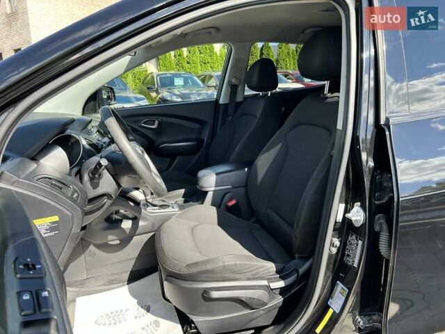 Чорний Хендай Туксон, об'ємом двигуна 2 л та пробігом 164 тис. км за 11490 $, фото 12 на Automoto.ua
