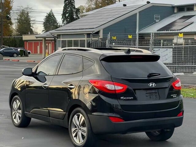 Черный Хендай Туксон, объемом двигателя 2.4 л и пробегом 80 тыс. км за 13000 $, фото 5 на Automoto.ua