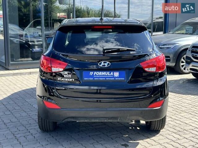 Чорний Хендай Туксон, об'ємом двигуна 2 л та пробігом 164 тис. км за 11490 $, фото 34 на Automoto.ua