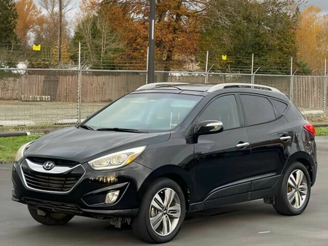 Черный Хендай Туксон, объемом двигателя 2.4 л и пробегом 80 тыс. км за 13000 $, фото 2 на Automoto.ua